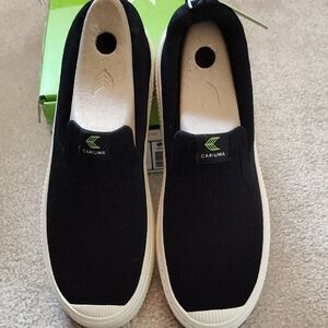 Cariuma Black and White Slip-On Sneakers